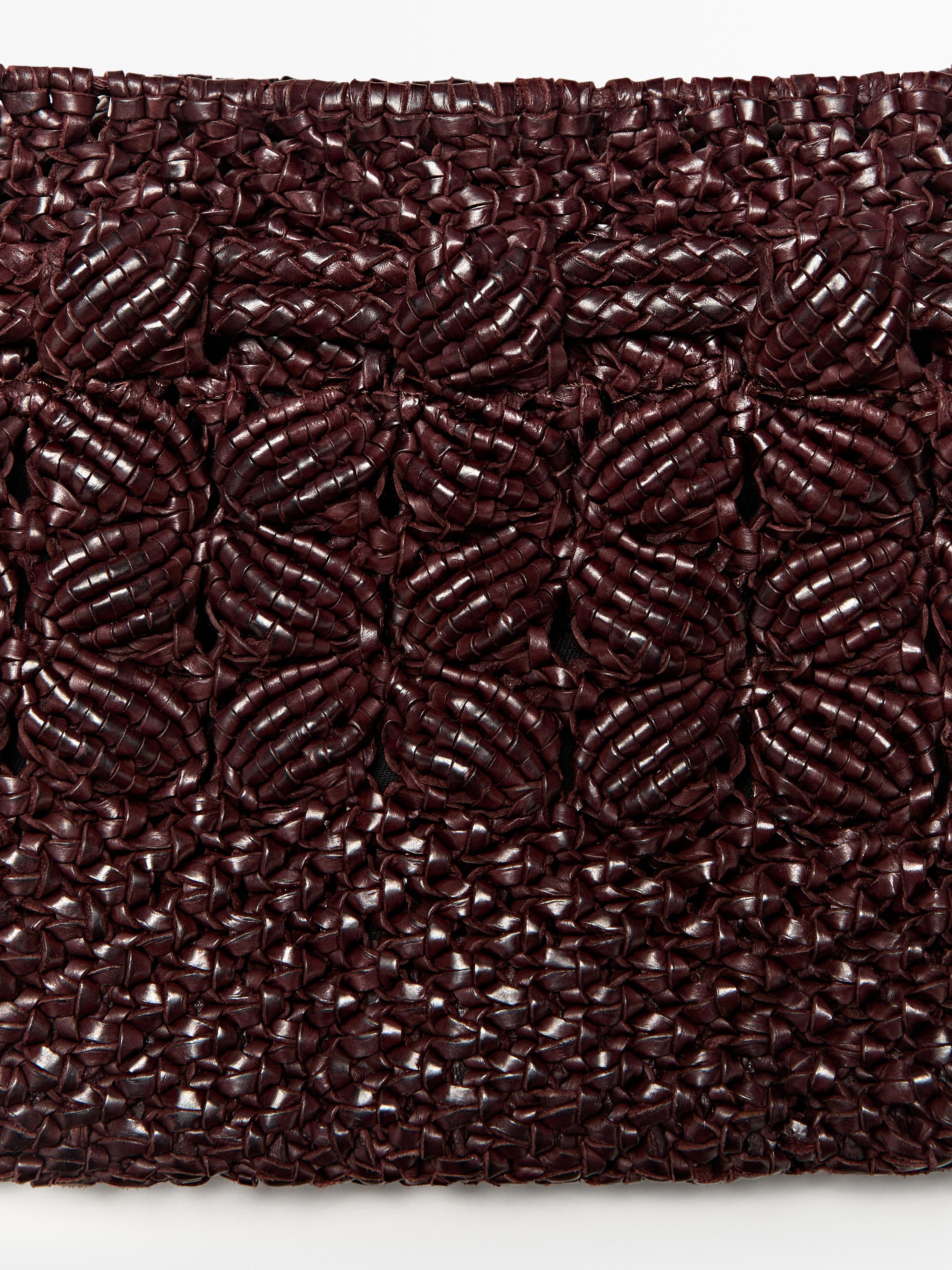 Sac pochette macramé en cuir nappa